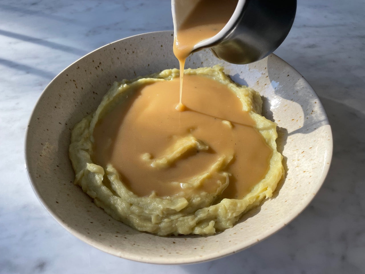 Jena's favorite Thanksgiving mashed sweet potatoes and bone broth gravy by Kacie Carter